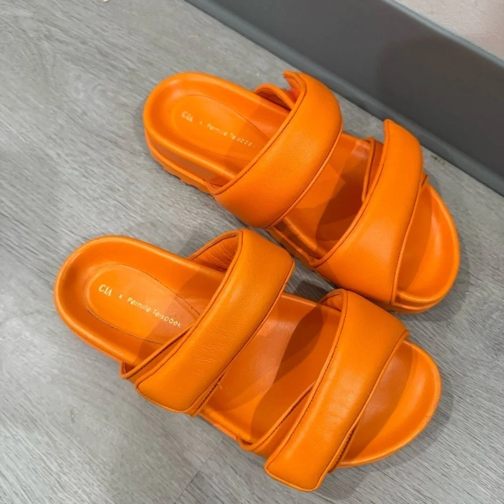 Gia Borghini x Pernille Teisbaek Sandals Leather Slides in Orange Leather